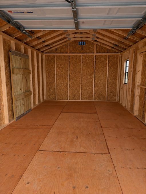 Empty Wooden Garage Interior 12'x20' Economy Ranch Wood Panel Garage