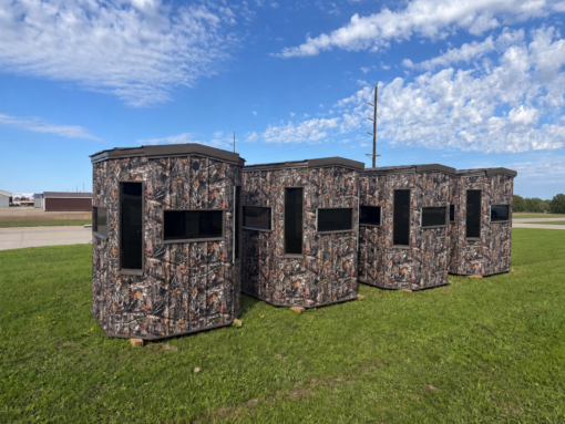 Four Camouflaged Blinds on Grass 6'x6' Octagon Deer Blind